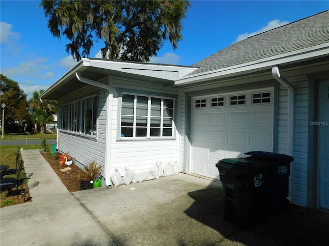 view of home's exterior with a garage