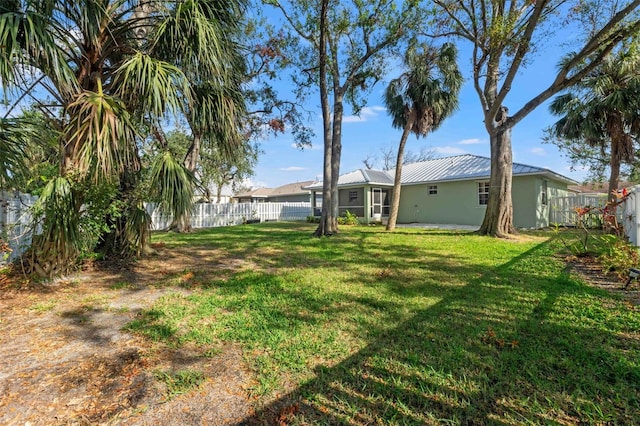 view of yard featuring a fenced backyard