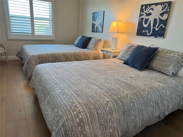 bedroom featuring hardwood / wood-style floors