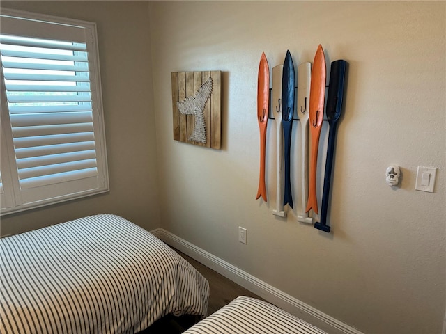 bedroom featuring wood-type flooring