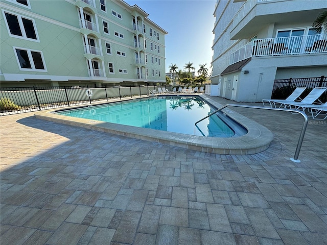 view of pool featuring a patio