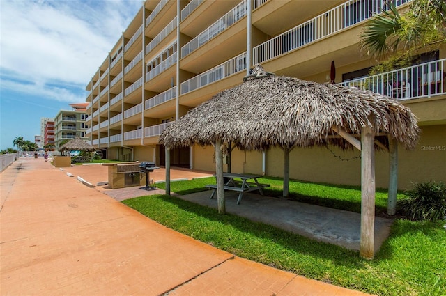 view of home's community featuring a gazebo and a patio