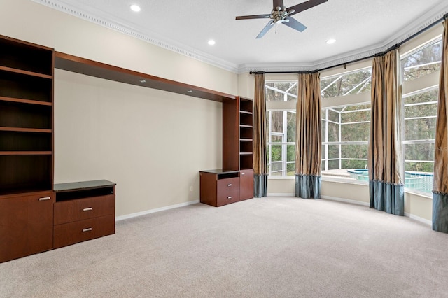 interior space featuring light carpet, ceiling fan, and ornamental molding