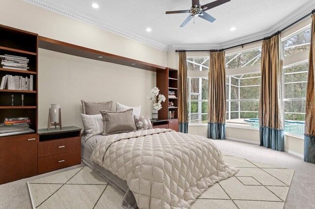 10106 Radcliffe Dr, Tampa, FL 33626 - bedroom with light colored carpet, crown molding, recessed lighting, ceiling fan, and baseboards