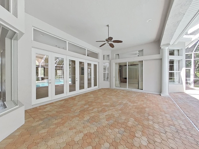 10106 Radcliffe Dr, Tampa, FL 33626 - unfurnished sunroom with french doors