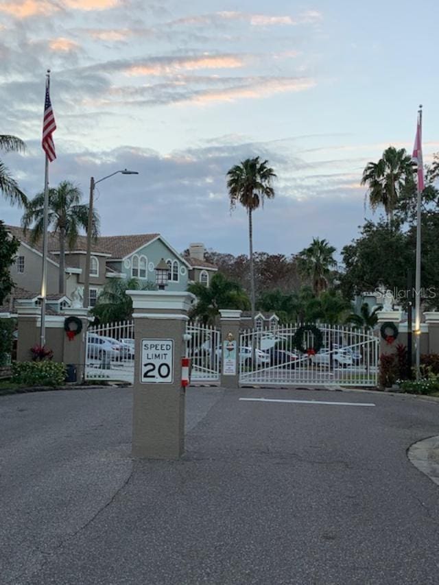 view of gate at dusk