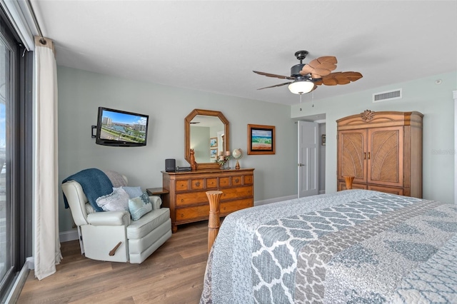 bedroom featuring ceiling fan and wood-type flooring