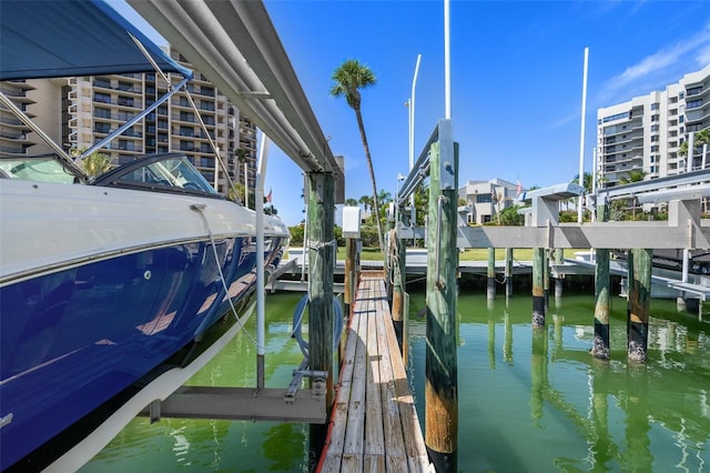 dock area featuring a water view