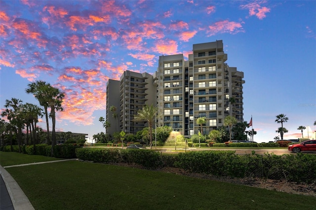 view of outdoor building at dusk