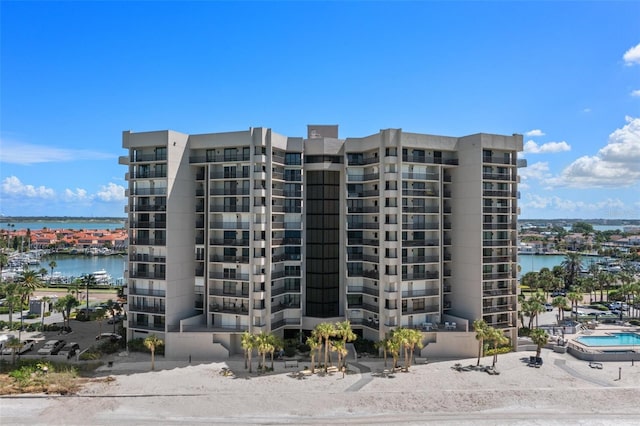 view of property with a water view