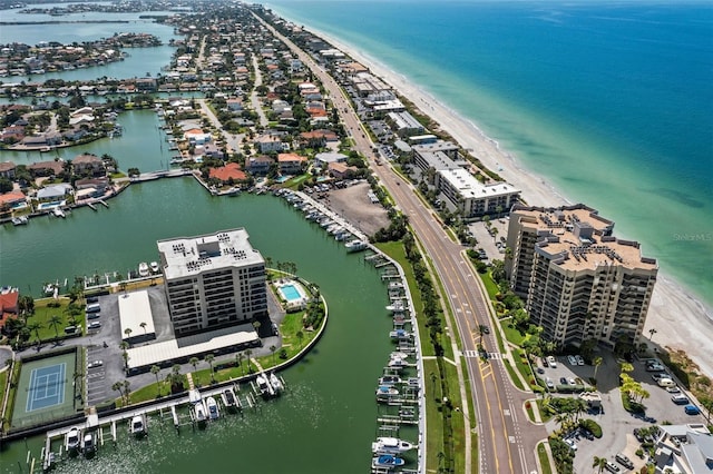 aerial view featuring a water view and a beach view