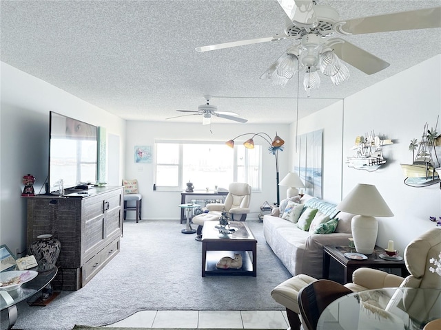 living room featuring light carpet and a textured ceiling