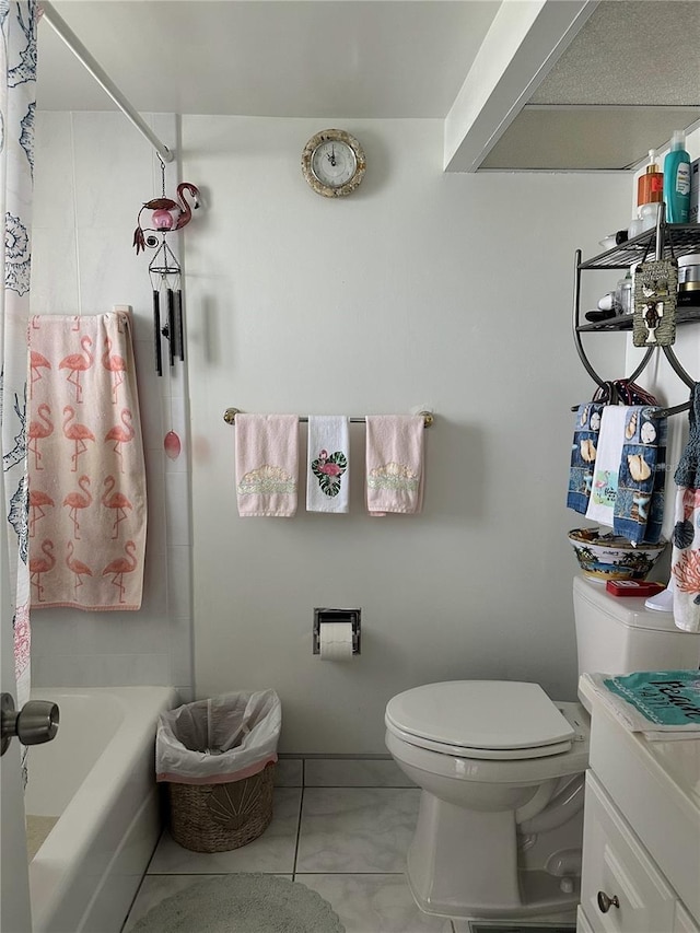 full bathroom featuring tile patterned flooring, vanity, bathtub / shower combination, and toilet