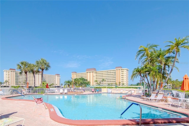 view of swimming pool with a patio area