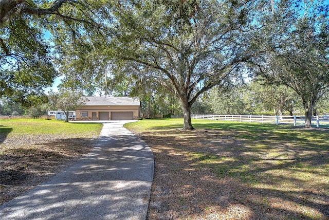 view of yard with a garage