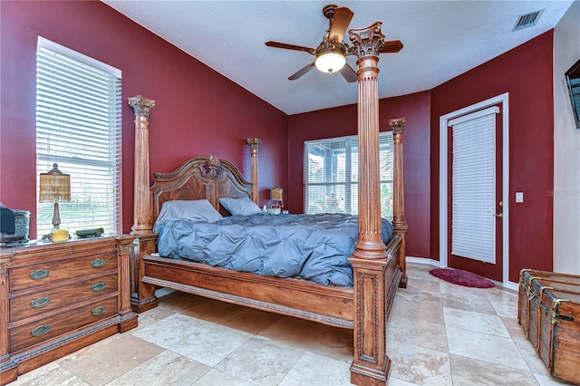 bedroom featuring ceiling fan and multiple windows