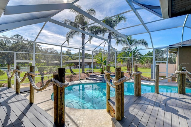 view of swimming pool with glass enclosure