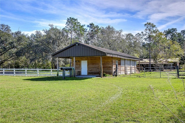 view of outbuilding with a rural view