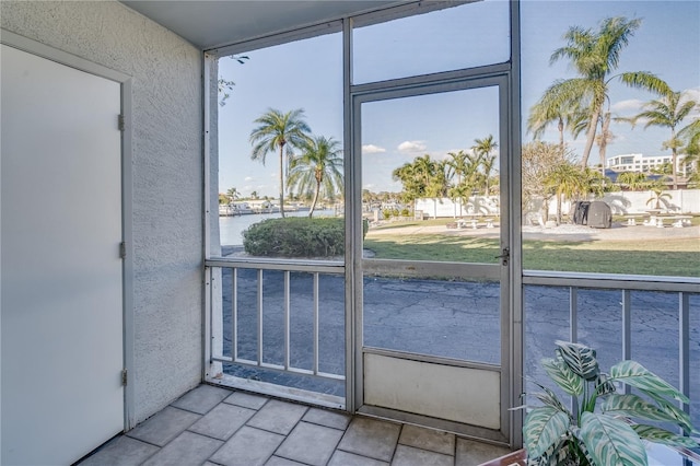 doorway to outside featuring a healthy amount of sunlight