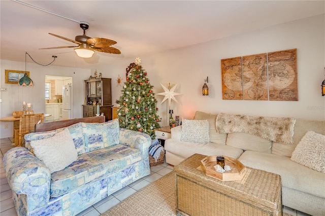 tiled living room with ceiling fan