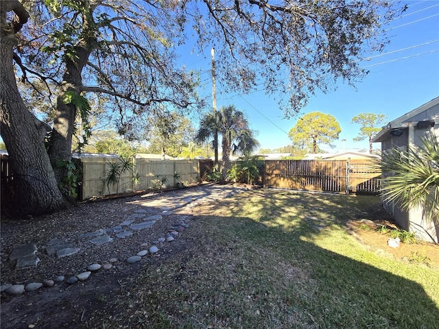 view of yard featuring a fenced backyard