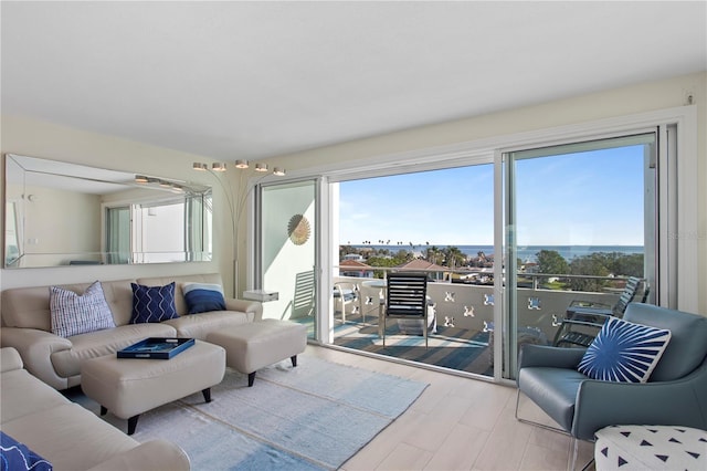 living room featuring a water view