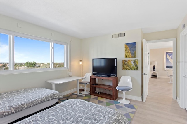 bedroom featuring light wood-type flooring