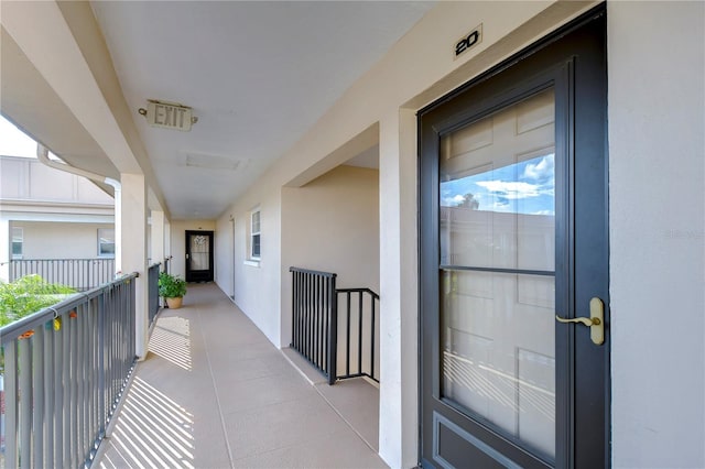 doorway to property with a balcony