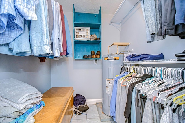 spacious closet featuring electric water heater