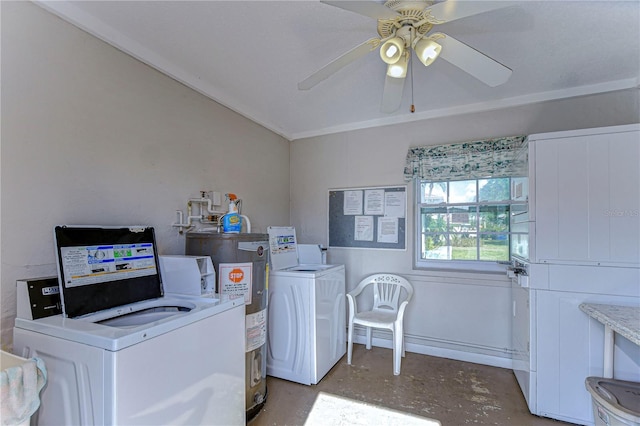 clothes washing area featuring electric water heater, ceiling fan, and washing machine and clothes dryer