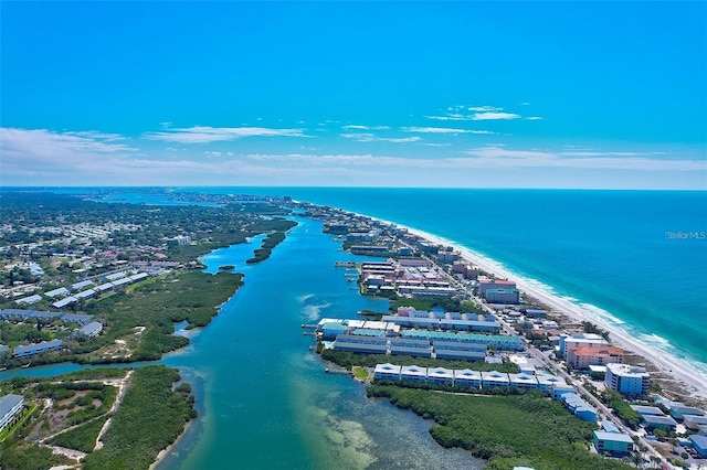 bird's eye view featuring a view of the beach and a water view