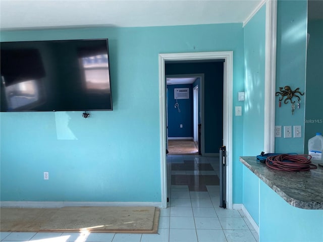 hall featuring light tile patterned flooring