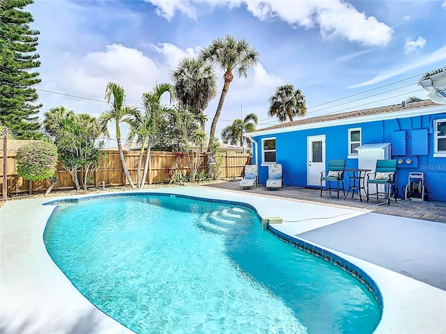 view of pool featuring a patio area