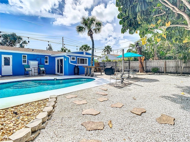 view of pool featuring a patio area