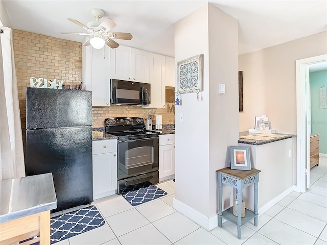 kitchen with black appliances, decorative backsplash, white cabinetry, and light tile patterned floors