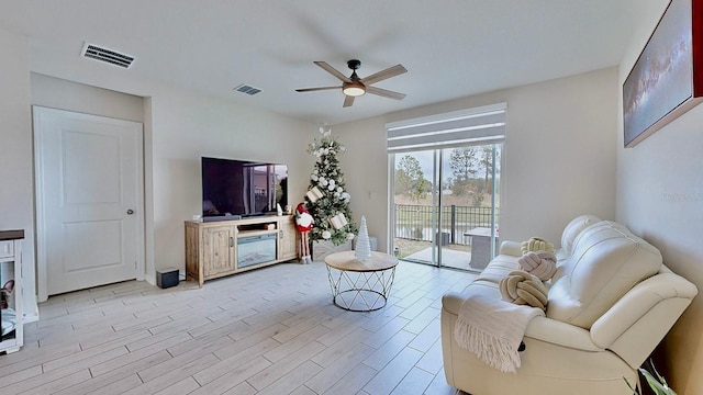 living room featuring ceiling fan