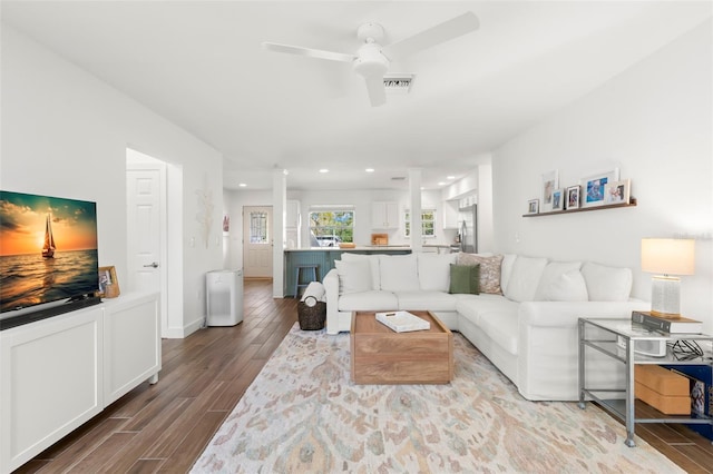 living room featuring ceiling fan