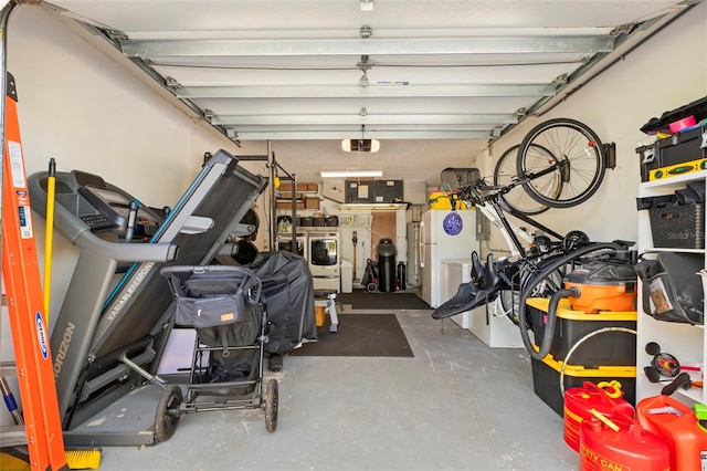 garage featuring washer and dryer