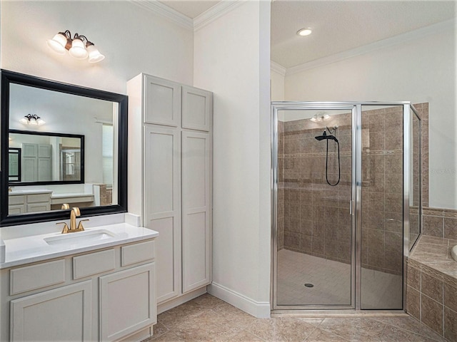 bathroom with tile patterned floors, vanity, shower with separate bathtub, and ornamental molding