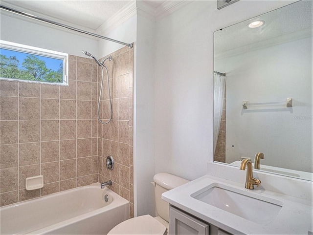 full bathroom with vanity, toilet, tiled shower / bath, and crown molding