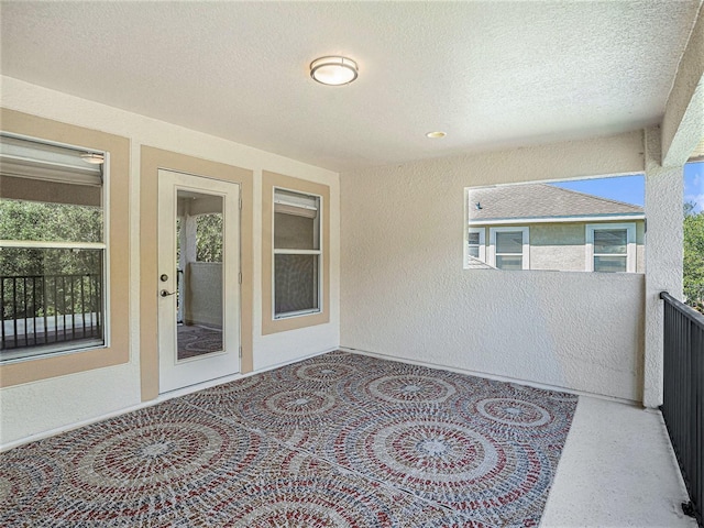 view of patio / terrace with a balcony