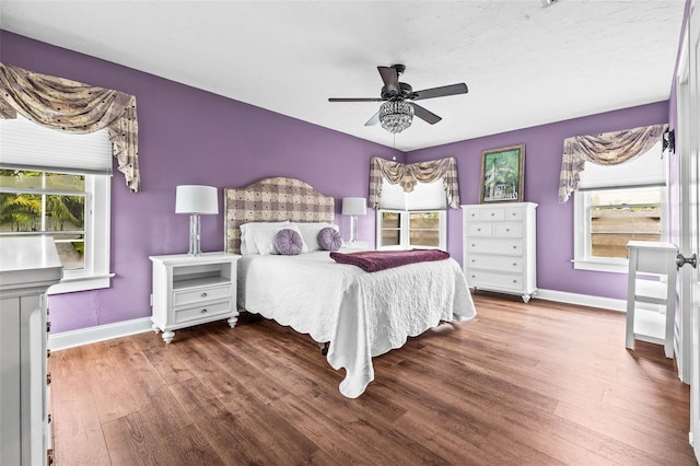 bedroom featuring ceiling fan and wood-type flooring