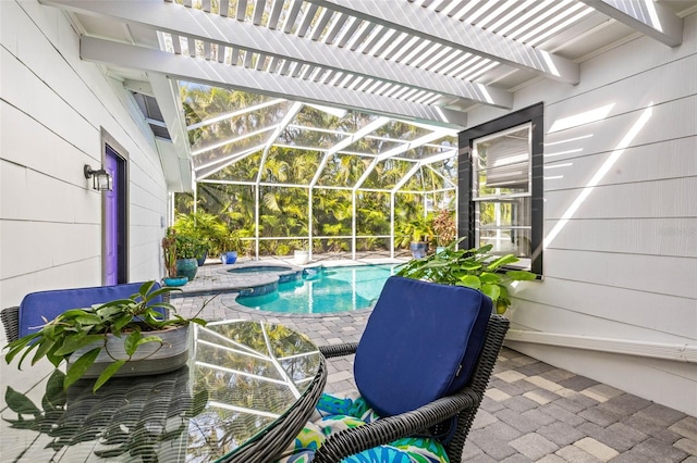 view of swimming pool with an in ground hot tub and a patio