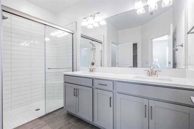 bathroom featuring vanity and walk in shower