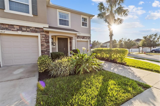 view of front of home with a garage