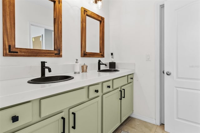 bathroom with tile patterned flooring and vanity