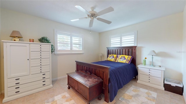 bedroom featuring ceiling fan and light tile patterned flooring