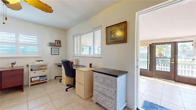 office space featuring ceiling fan and light tile patterned floors