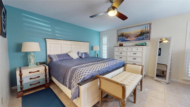 bedroom featuring ceiling fan and light tile patterned flooring