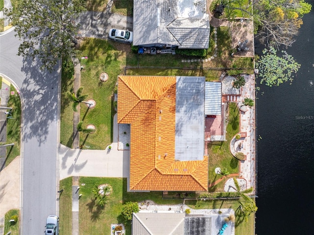 drone / aerial view with a water view